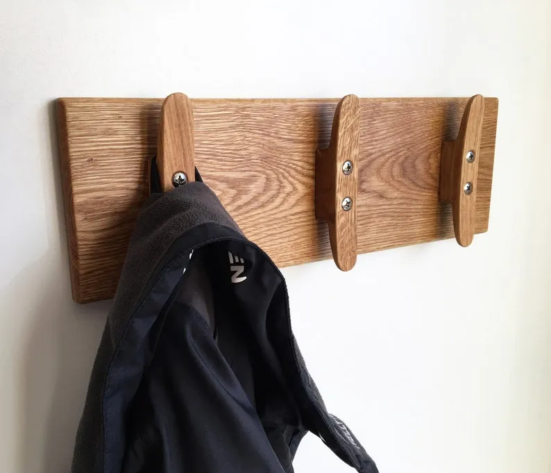 Coat rack lying flat on a workbench before mounting