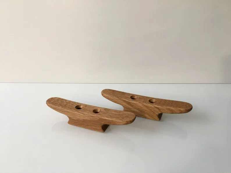 Underside of the cleat with two 6mm holes drilled 30mm apart
