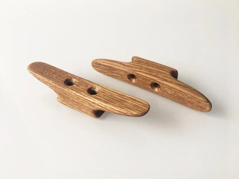 Top view of the mini cleat and its two countersunk screw holes