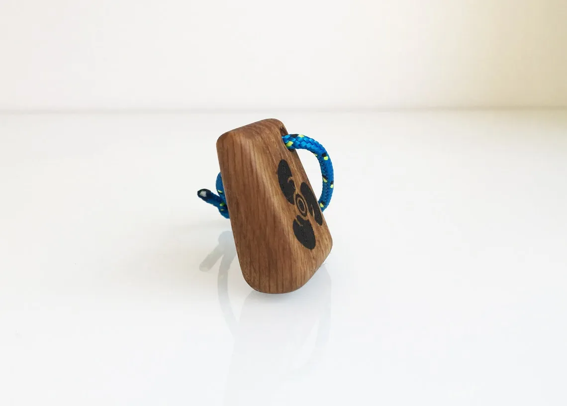 Propeller keychain held in a hand, small enough for a pocket