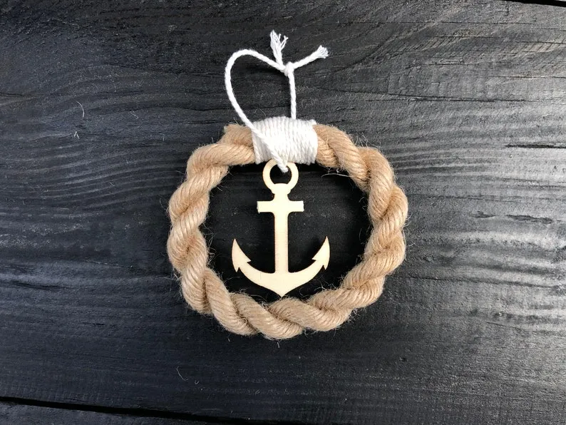 Round jute rope Christmas ornament, about 10cm across, on a table
