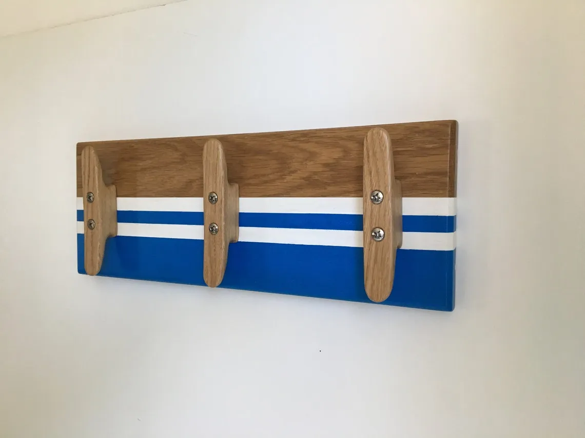 Oak grain and varnish detail along the shaped backing board