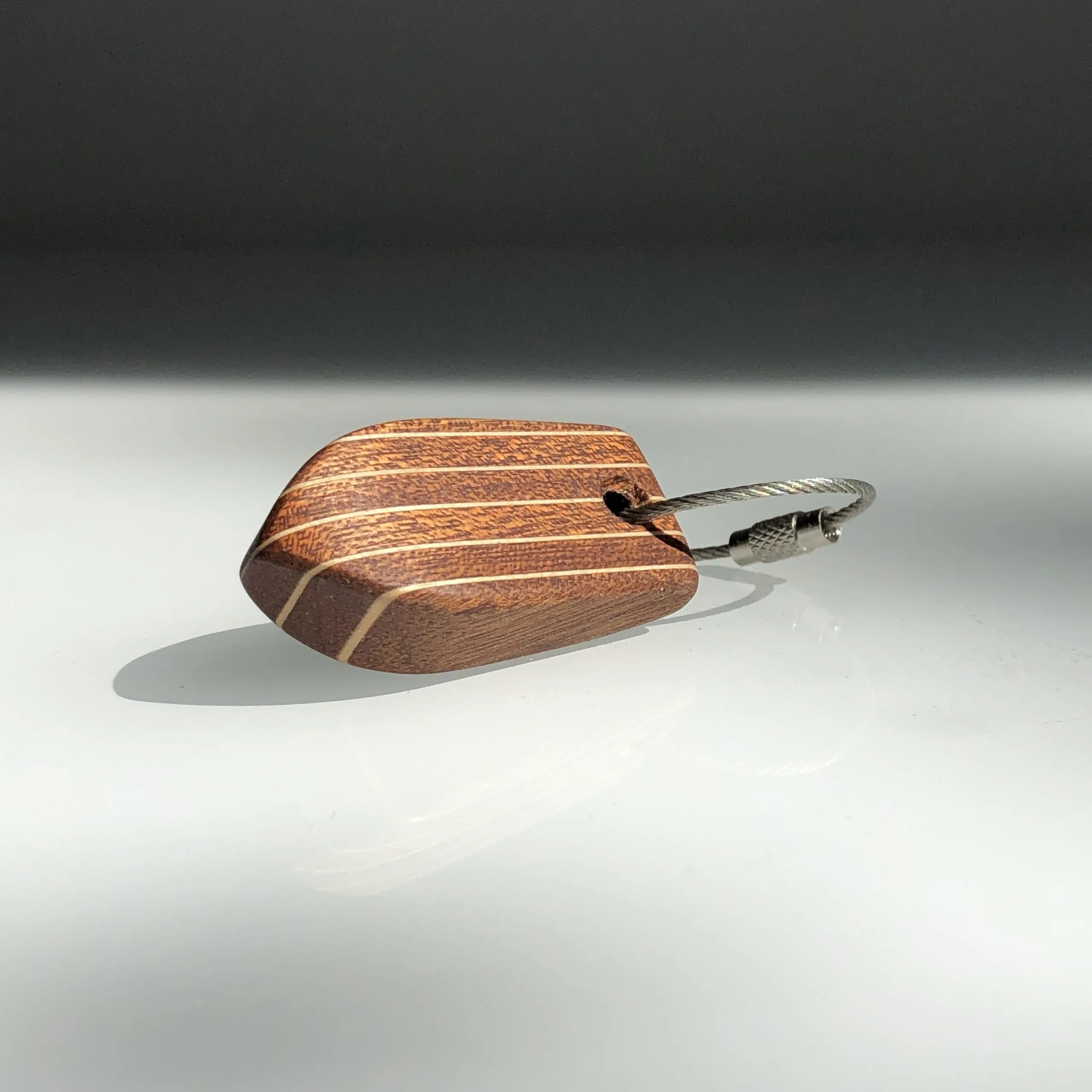 Side profile showing the laminated layers and rounded edges