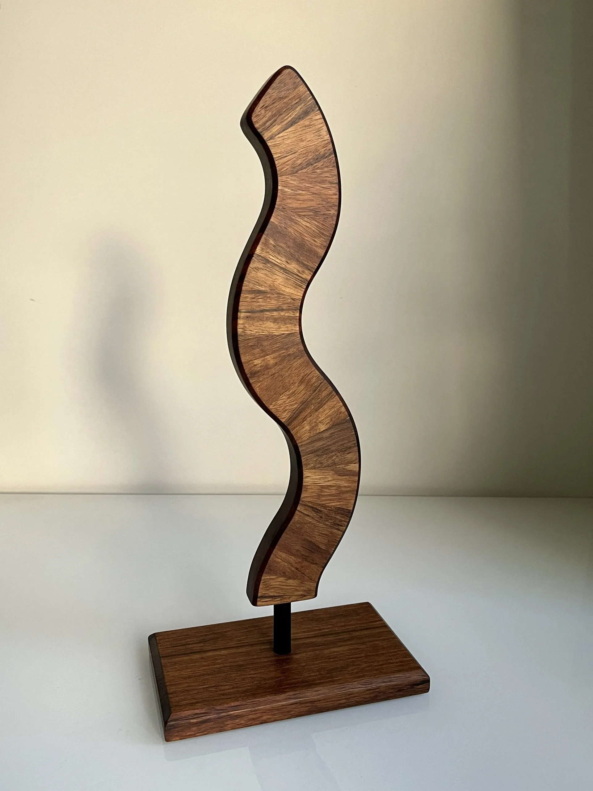 Sea Weed sculpture standing on a table top beside a window