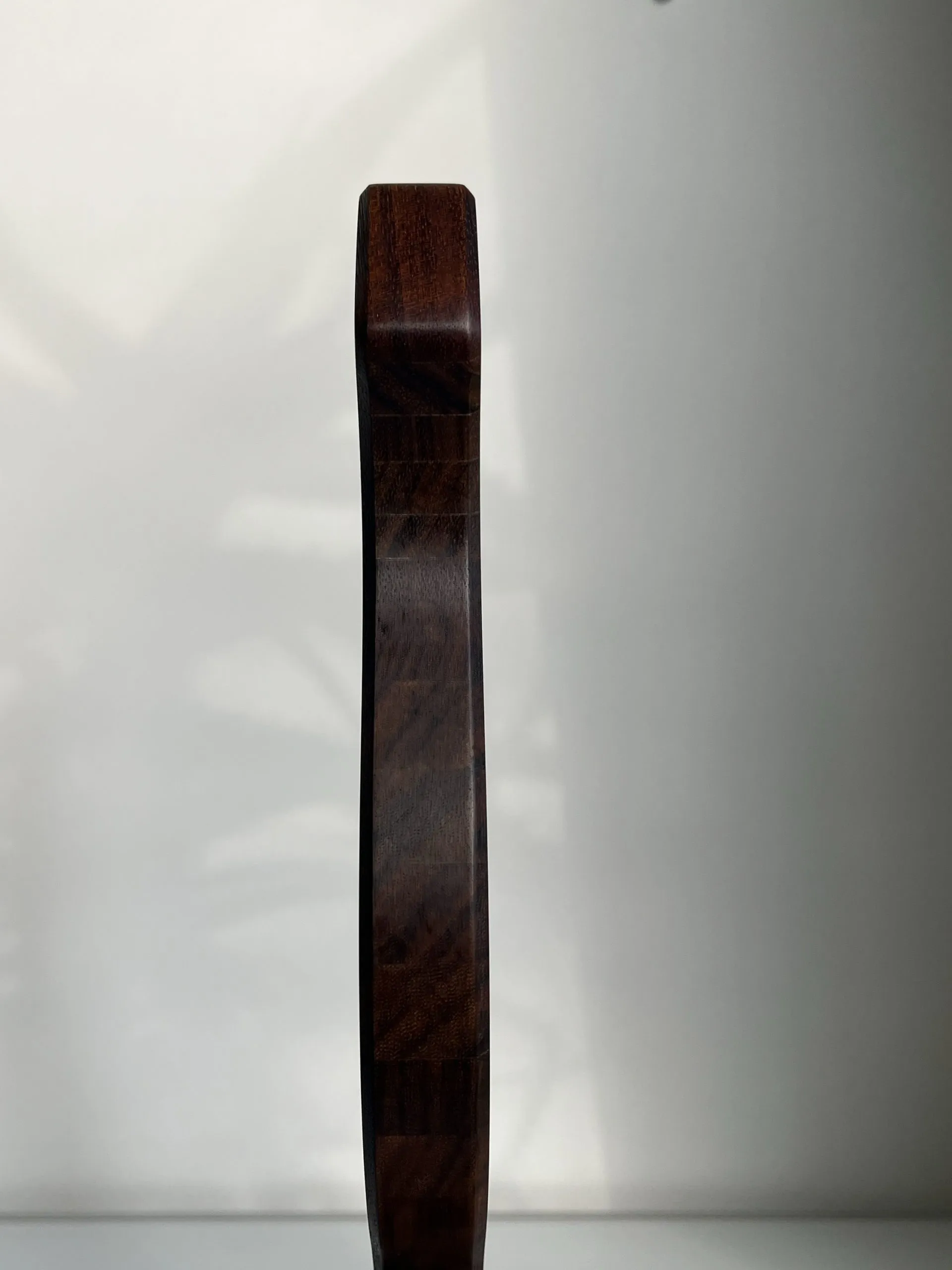 Side profile showing how thin the sculpture is, barely two centimetres