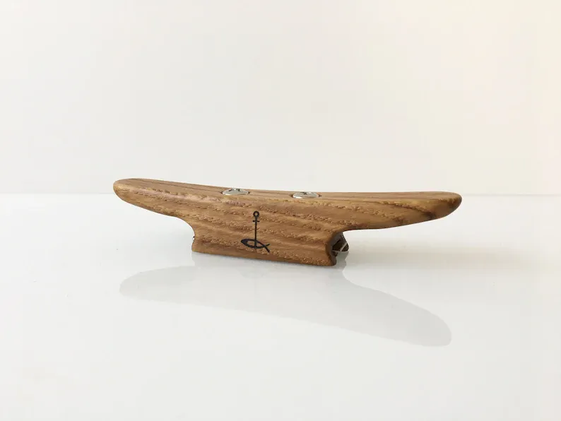 The opener next to a real boat cleat for comparison