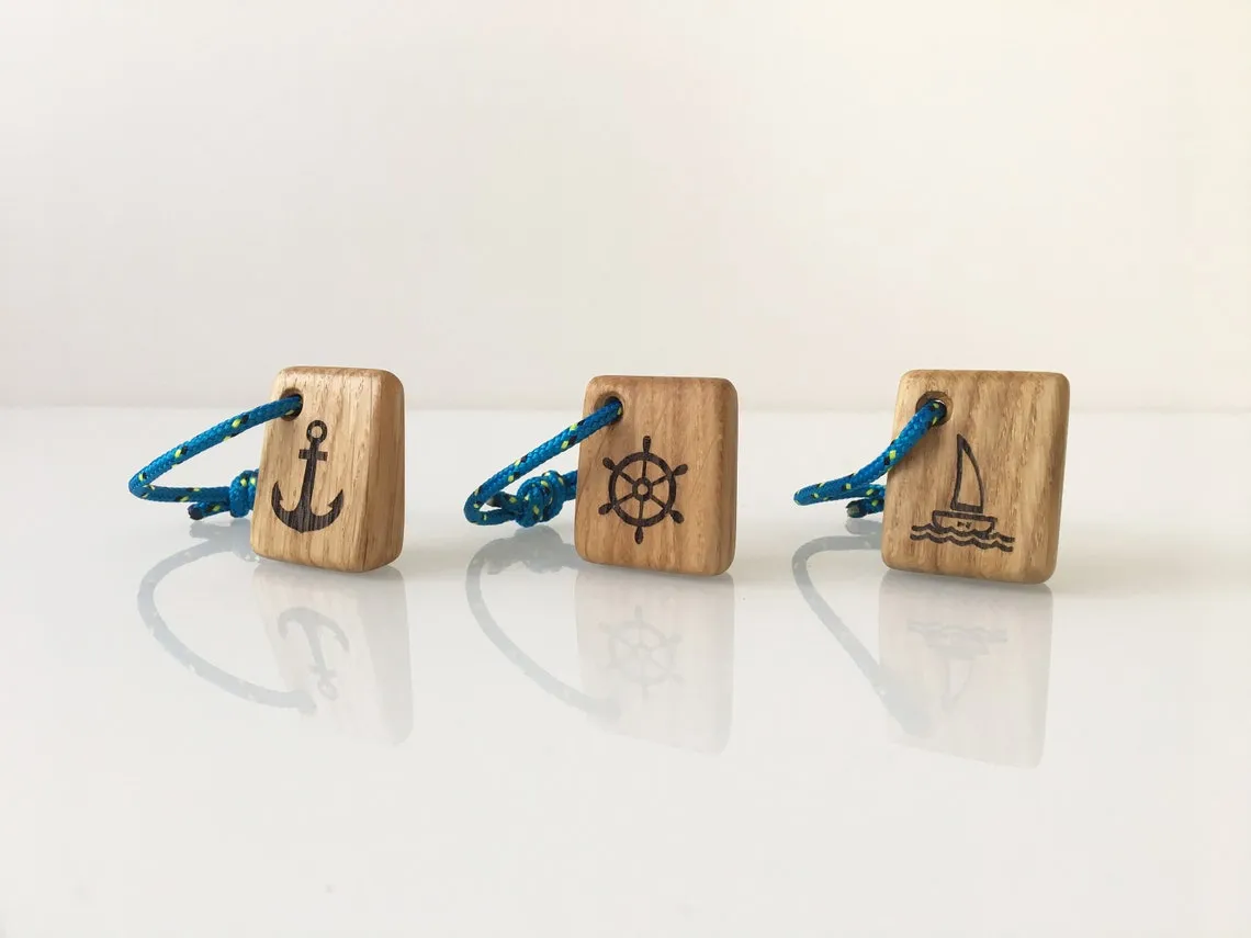 Keychain on a workbench among offcuts left from boat cleats